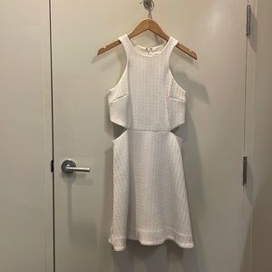White summer dress. Heavy fabric, lined. Side cutouts.